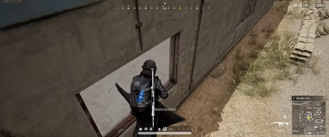 绝地求生怎么一边打一边蹲